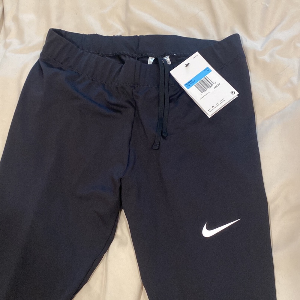 NWT Nike running leggings with ankle zipper and drawstring